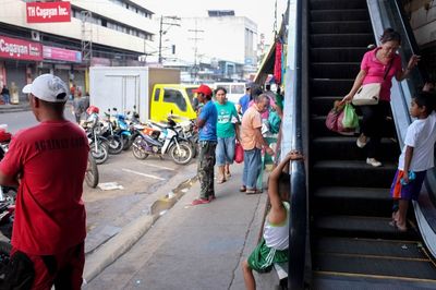 People on multi colored city street