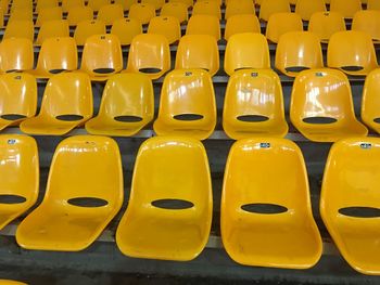 Full frame shot of empty yellow chairs