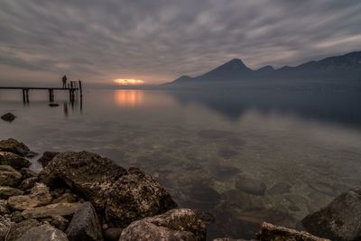 Scenic view of sea against sky at sunset