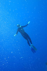 Person swimming in sea