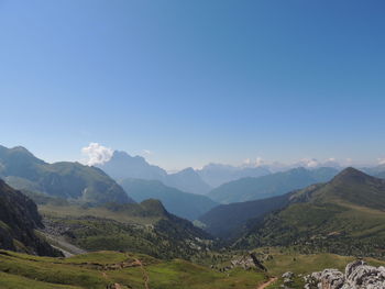 Scenic view of mountains against clear blue sky