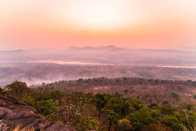 Scenic view of landscape against sky during sunset