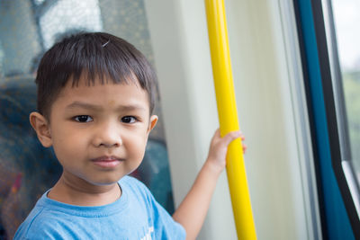 Portrait of innocent boy traveling in train
