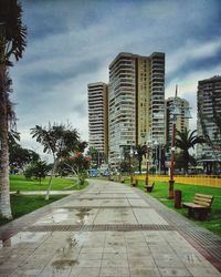 View of city against cloudy sky