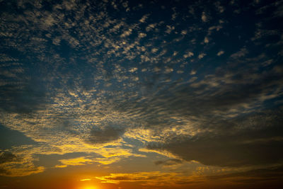 Low angle view of dramatic sky during sunset