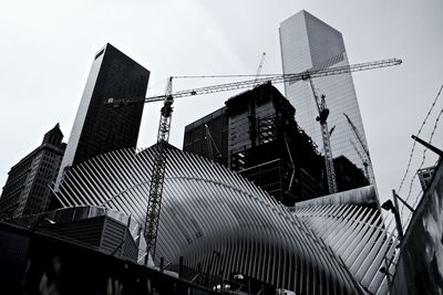 Low angle view of modern buildings against sky