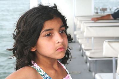 Close-up portrait of a girl looking down