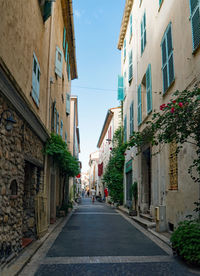 Narrow alley amidst buildings in town