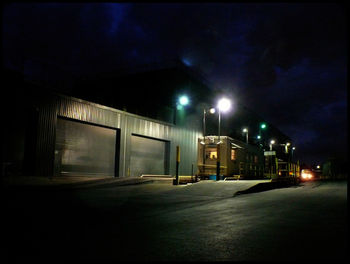 Illuminated street light at night