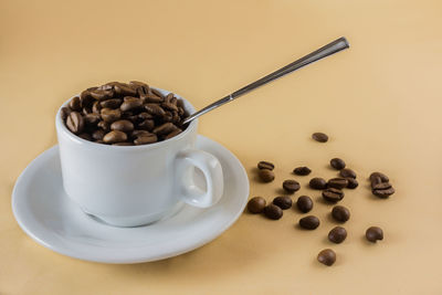 Close-up of coffee cup on table