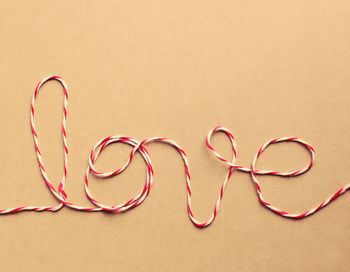 High angle view of love text made from string