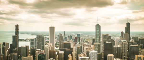 Modern buildings in city against cloudy sky ,chicago city,usa