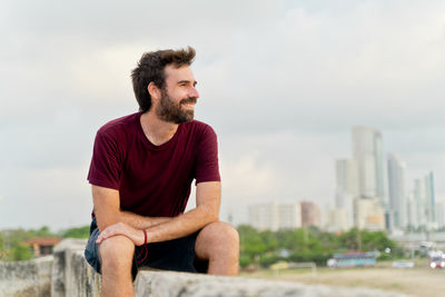 Portrait of young man looking away