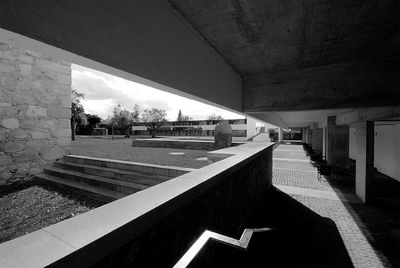 Empty walkway leading to building