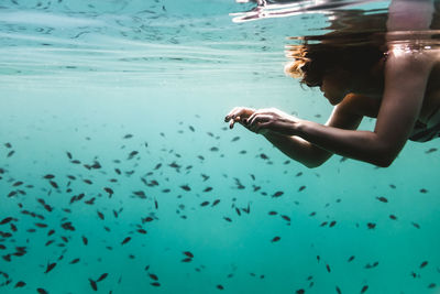 Woman swimming underwater