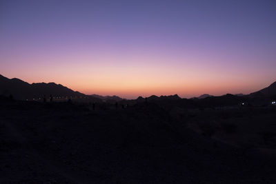 Scenic view of silhouette landscape against sky during sunset