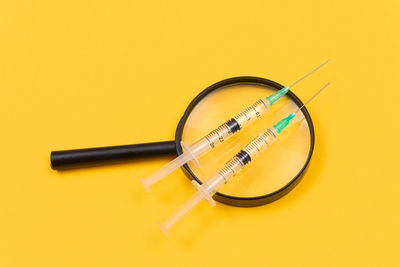 High angle view of vintage car on yellow background