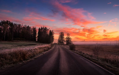 Road against sky during sunset