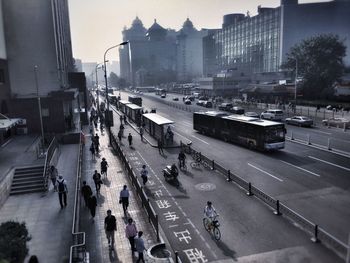 High angle view of people on street in city