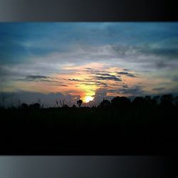 Scenic view of sunset over landscape