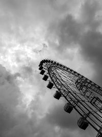 Low angle view of rollercoaster against sky