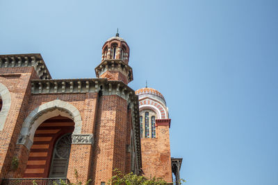 Low angle view of historic building against sky