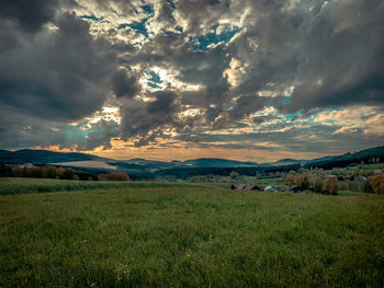 Scenic view of field against sky