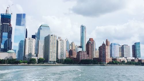 View of city against cloudy sky