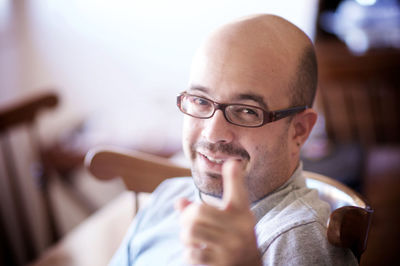 Portrait of man wearing eyeglasses