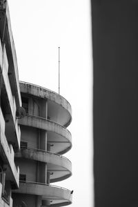 Low angle view of factory against sky