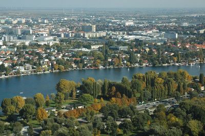 High angle view of buildings and trees against sky