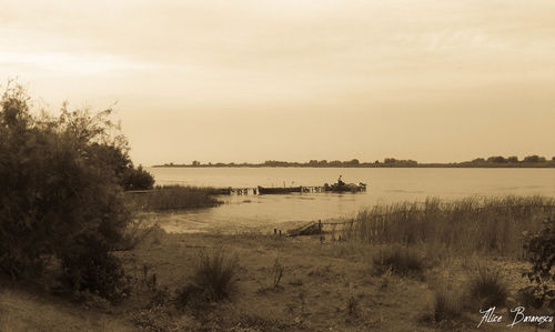 Scenic view of lake against sky