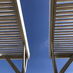 Low angle view of building against clear blue sky