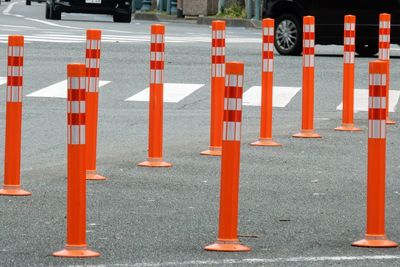 Red sticks on a row of road