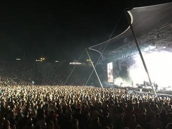 Crowd at music concert at night