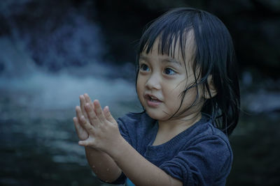 Portrait of cute smiling girl outdoors