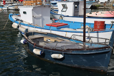 Boats moored at harbor