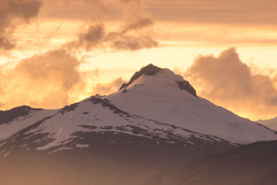 Scenic view of mountain against sky during sunset