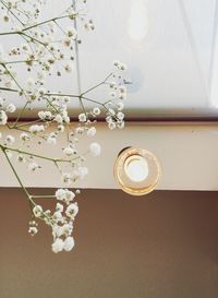 Close-up of illuminated lamp on table