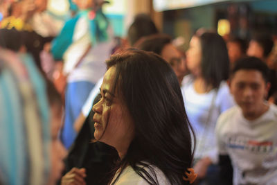 Side view of young woman dancing