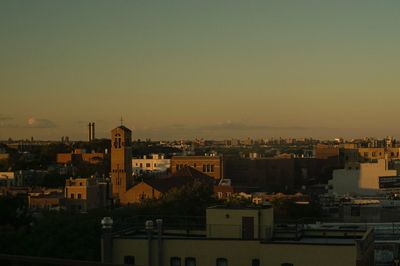 High angle shot of cityscape against clear sky