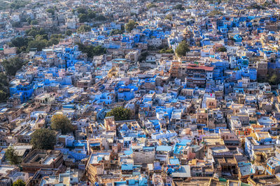 High angle view of illuminated buildings in city