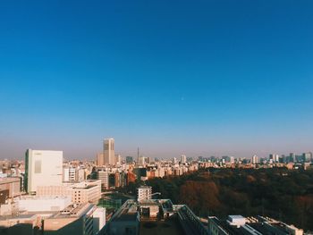 View of buildings against blue sky