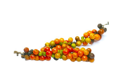 Close-up of fruits against white background