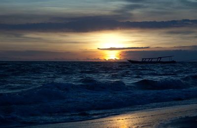 Scenic view of sea at sunset