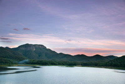 Scenic view of lake against sky during sunset