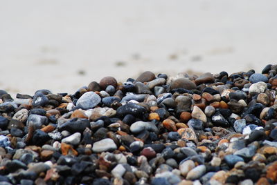 Close-up of pebbles on beach