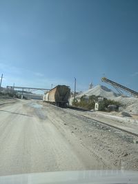 Road against clear sky