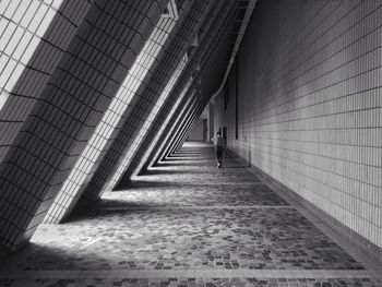 Full length of woman walking in building