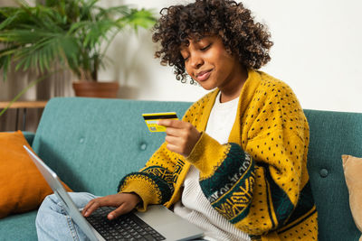 Young woman using mobile phone